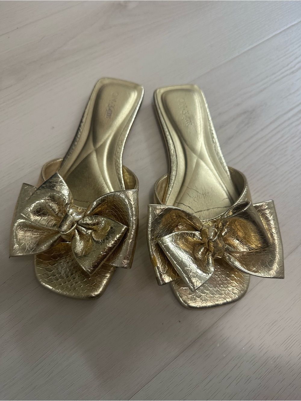 Women’s Metallic Gold Bow Slip-On Flats